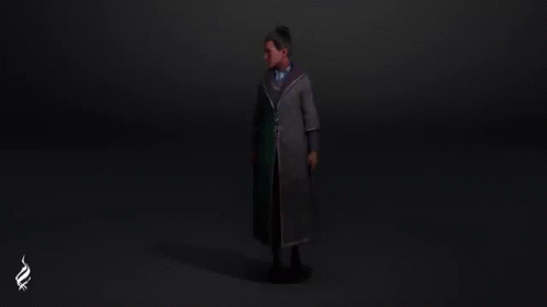 Man in Coat and Tie Holding Wand in Dark Room