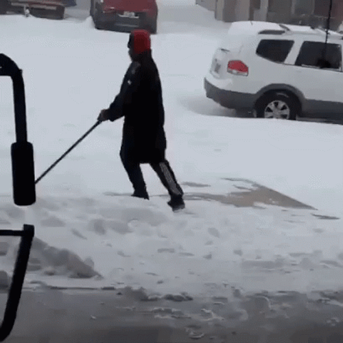 Man In Comical Slipping On Ice Moment GIF
