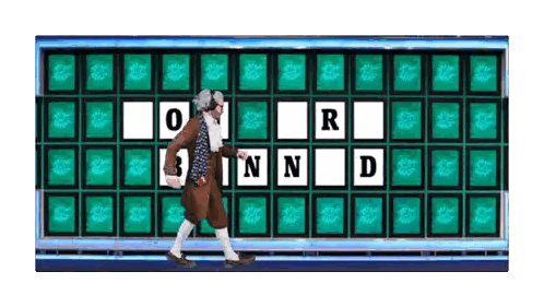 Man in Costume in Front of Wheel of Fortune
