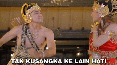 Man in Costume Standing Beside Woman Tak Kusangka Ke Lain Hati