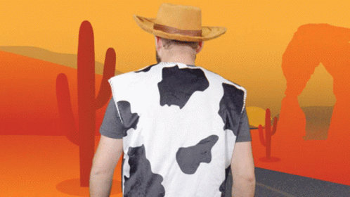 Man in Cow Print Vest and Cowboy Hat