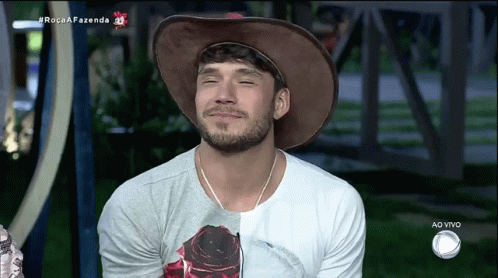 Man In Cowboy Hat And Ao Vivo T-Shirt GIF