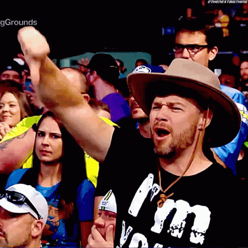 Man in Cowboy Hat and Crowd T-Shirt