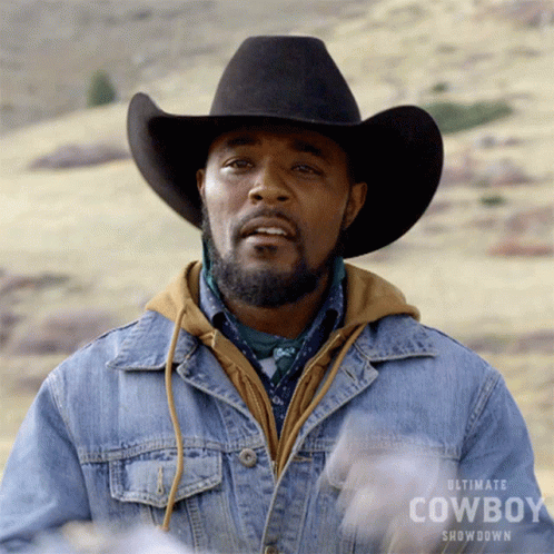 Man In Cowboy Hat And Denim Jacket GIF