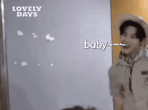 Man In Cowboy Hat And Headphones Says Baby GIF