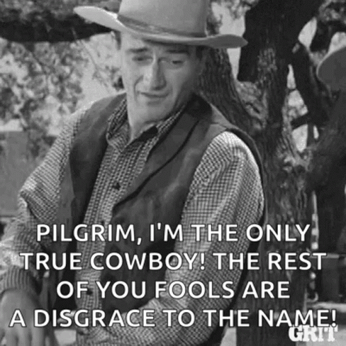 Man in Cowboy Hat by Tree