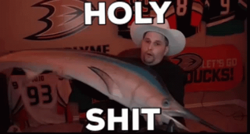 Man In Cowboy Hat Holding Fish With Holy Shit GIF