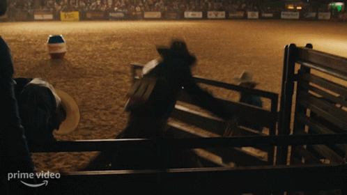 Man in Cowboy Hat in Front of Fence Prime Video
