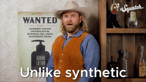 Man in Cowboy Hat in Front of Wanted Poster