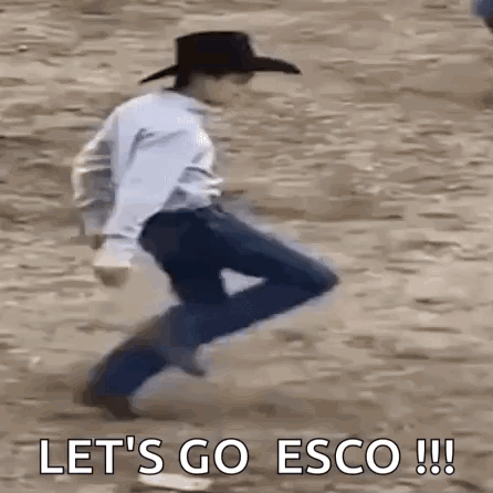 Man in Cowboy Hat Jumping in Dirt with Let's Go Esco