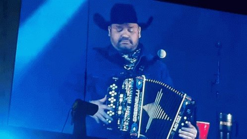 Man In Cowboy Hat Playing Accordion With Gabrielli GIF