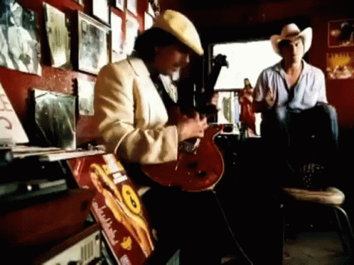 Man In Cowboy Hat Playing Guitar GIF
