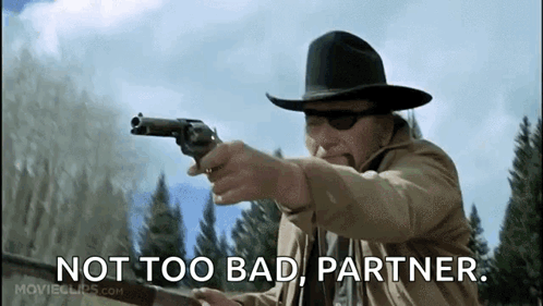 Man in Cowboy Hat Pointing Gun Saying Not Too Bad Partner
