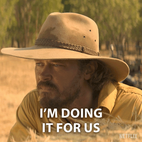 Man in Cowboy Hat Saying Im Doing It For Us