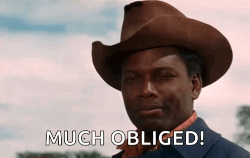 Man In Cowboy Hat Saying Much Obliged GIF