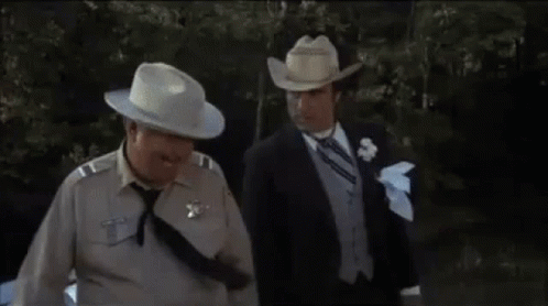 Man In Cowboy Hat Says What The Hell Is The World Comin' To GIF