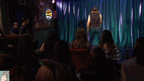 Man in Cowboy Hat Singing