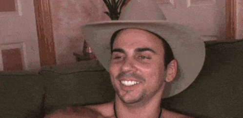 Man in Cowboy Hat Smiling