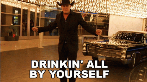 Man In Cowboy Hat Standing By Car Drinkin All By Yourself GIF