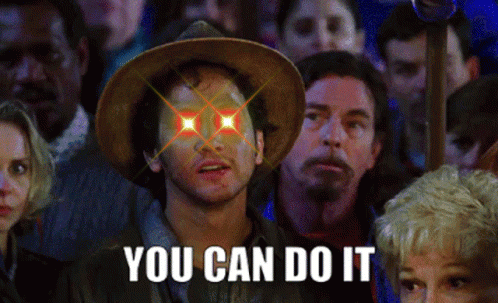 Man in Cowboy Hat Stands in Front of Crowd Says You Can Do It