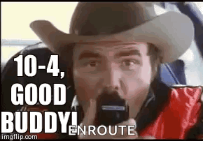 Man in Cowboy Hat Talking on Phone