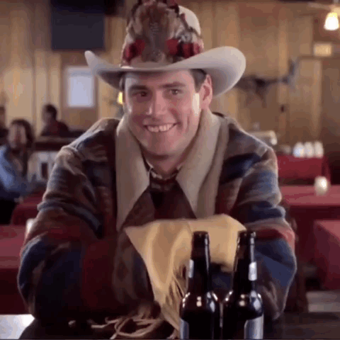 Man In Cowboy Hat With Beer Bottles GIF