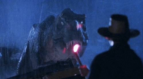 Man in Cowboy Hat with Dinosaur
