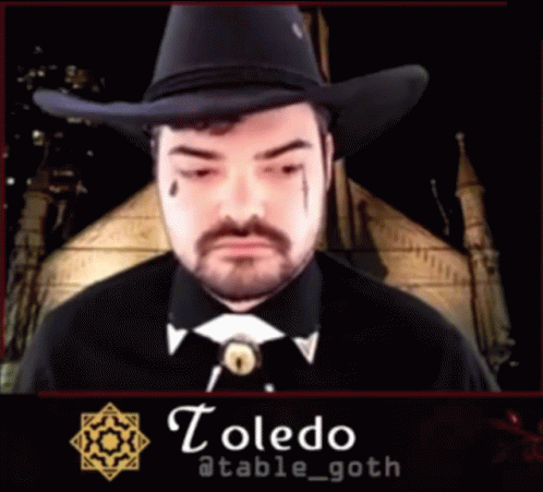 Man in Cowboy Hat With Toledo