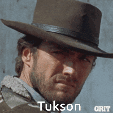 Man in Cowboy Hat With Tuxson