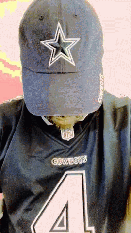 Man in Cowboys Jersey and Hat