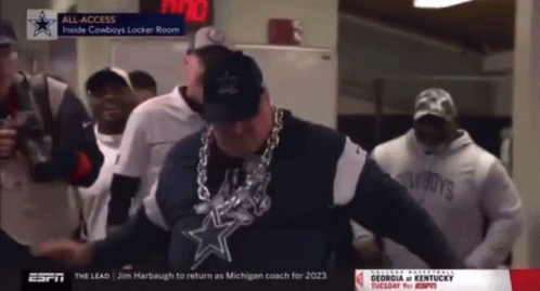 Man in Cowboys Sweatshirt Dancing