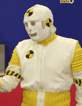 Man In Crash Test Dummy Costume In Front Of Bbbo Sign GIF