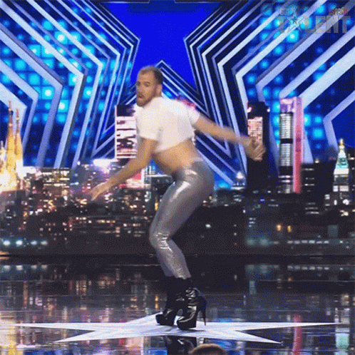 Man In Crop Top And High Heels GIF