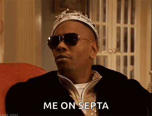 Man in Crown and Sunglasses Says Me on Septa