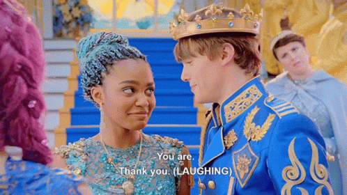Man in Crown Beside Woman