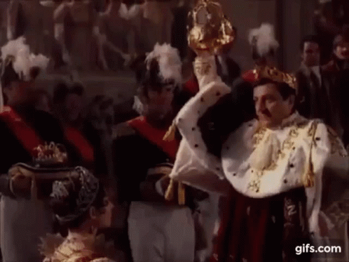 Man In Crown Holding Trophy GIF