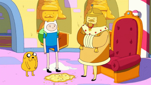 Man in Crown Sitting on Chair