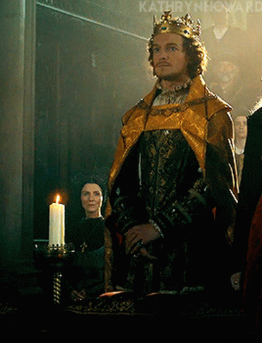Man in Crown Standing Before Candle Kathryn Howard