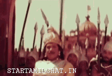 Man In Crown Standing Before Crowd GIF