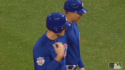 Man in Cubs Jersey Praying