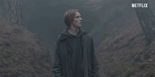 Man in Dark Forest with Netflix Logo
