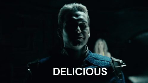 Man in Dark Room Says Delicious