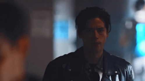 Man In Dark Room With Blue Light GIF