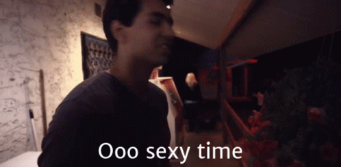 Man In Dark Room With Ooo Sexy Time GIF