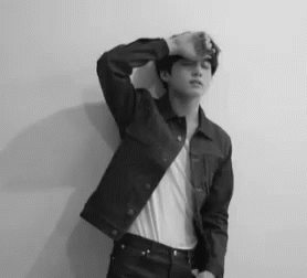 Man in Denim Jacket and White Shirt