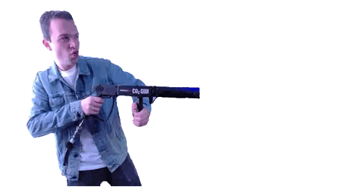 Man in Denim Jacket Holding Smoke Gun
