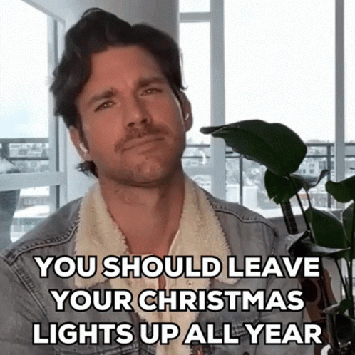 Man in Denim Jacket Says You Should Leave Your Christmas Lights Up All Year