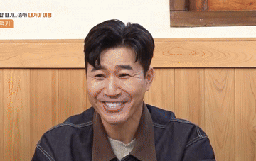 Man in Denim Jacket Smiling