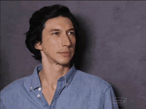 Man In Denim Shirt Looking Away GIF