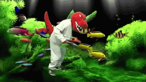 Man In Dinosaur Costume In Aquarium GIF